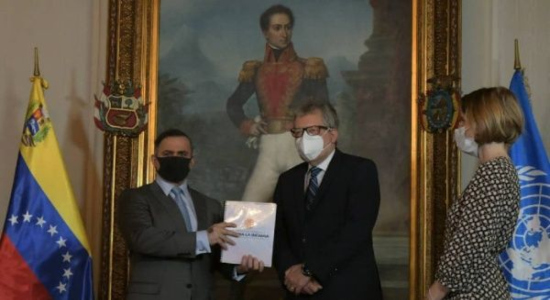 Tarek William Saab y el representante de la ONU