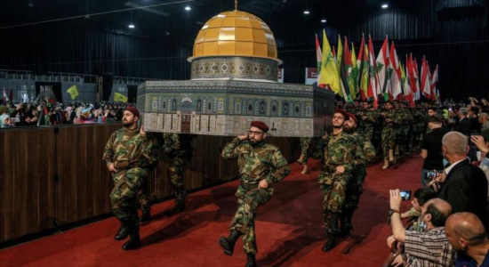 Combatientes de Hezbolá durante una manifestación masiva para conmemorar el Día Mundial de Al-Quds en Beirut, 29 de abril de 2022.